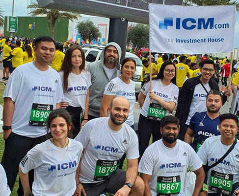 Logo of ICM.com with Dubai Marathone Participants