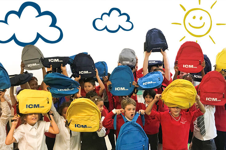 Image of School Students with Colorful Bags Having ICM.com